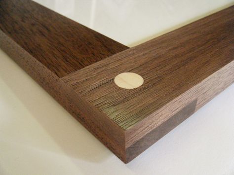 A Close-up of a walnut lap joint with a maple peg.  A beautiful frame built to last! Picture Frame Joinery, Walnut Picture Frame, Wood Photo Frame Design, Craftsman Frames, Wood Joining, Living Room Library, Traditional Picture Frames, Carpentry And Joinery, Japanese Joinery