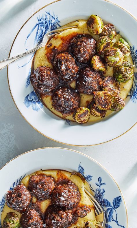 We're loving this creative take on classic meatballs: grass-fed meatballs agrodolce from Martha & Marley Spoon! Meatballs packed with dried currants are cooked in a skillet and then simmered in a rich balsamic broth. A base layer of buttery polenta and a side of crispy, roasted Brussels sprouts finishes the dish. Sign up today to get creative recipes and fresh ingredients delivered to your door! Marley Spoon Recipes, Delicious Vegetarian Recipes, How To Cook Polenta, Marley Spoon, How To Cook Meatballs, Creative Recipes, No Carb Recipes, Roasted Brussels Sprouts, Health Dinner Recipes