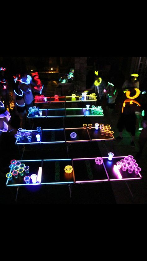 Glow Party Ideas Outdoor, Glow In The Dark Beer Pong, Glow Party Outdoor, Glow In The Dark Graduation Party Ideas, Glow In The Dark Graduation Party, Glow In The Dark Party Ideas Pool, Prom Activity Ideas, Glow Stick Pool Party, Glow In The Dark Pool Party