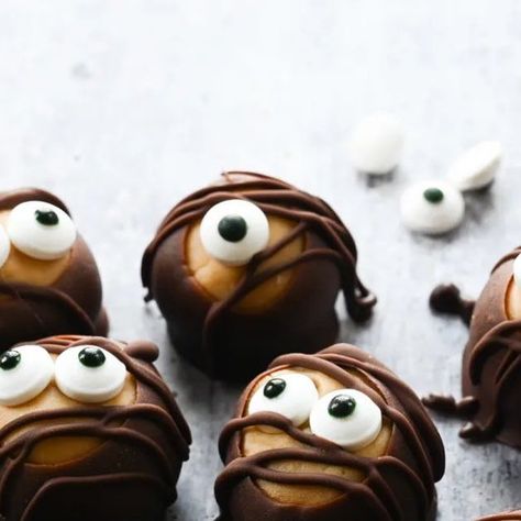 Jennifer Segal on Instagram: "Peanut butter-chocolate fans, unite! Reece’s has nothing on these spooky little Halloween buckeyes. 👻 They’re easy to make, even for those who are artistically-challenged. Recipe link in bio 👉 @onceuponachef • #buckeyes #chocolate #peanutbutter #halloweenbuckeyes #chocolatepeanutbutter #spookytreat #halloween2023 #homemadecandy #halloweencandy #halloweentreat #testedandperfected" Halloween Buckeyes, Buckeye Balls, Chocolate Peanutbutter, Chocolate Fan, Spooky Treats, Homemade Candies, Butter Chocolate, Halloween Candy, Chocolate Peanut Butter