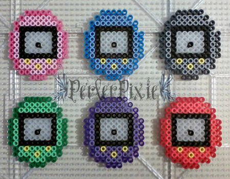 Mini Tamagotchi by PerlerPixie Tamagotchi Perler Beads, Pixel Tamagotchi, Perler Bead Games, Tamagotchi Pixel Art, Mini Perler Bead Patterns, Maya Fey, Hamma Beads Ideas, Pixel Beads, Melty Bead Patterns