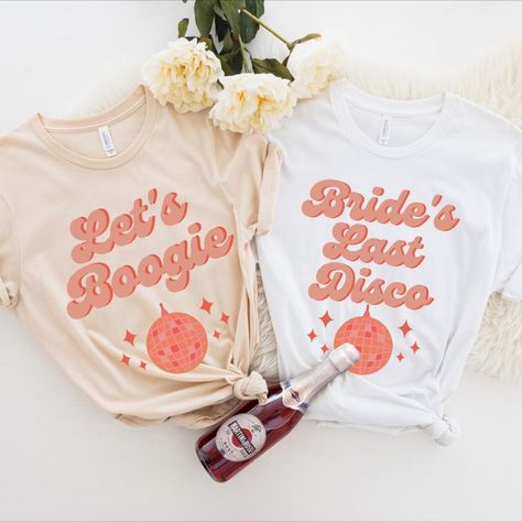 If you're a groovy bride ready to celebrate your bride's last disco with your crew, these Last Disco bachelorette shirts are perfect! These ultra soft shirts will compliment your Last Disco bachelorette party making sure you have a the most retro and groovy bachelorette party ever with these disco theme shirts for a total 70s vibe! Groovy Bachelorette Party, Batchlorette Party, Last Disco Bachelorette Party, Disco Shirts, Bachelorette Party Cookies, Bachelorette Party Essentials, Groovy Bachelorette, Last Disco Bachelorette, Disco Bachelorette Party