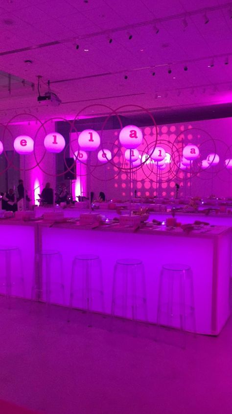 Can you tell what Bella's favorite color is? The parents throwing this bat mitzvah wanted to create a "grown up" but still fun environment by covering this modern white venue in hot pink up lighting. Sticking with the grown up theme, our sales consultant Regan, came up with a menu putting a "grown up" twist on traditional kid appetizers. There was also a surprise glowing dessert station that included glowing cotton candy and LED ice cubes for the rock candy mocktails. Kid Appetizers, Pink Bat Mitzvah, Led Ice Cubes, Bat Mitzvah Themes, Mitzvah Themes, Sales Consultant, Appetizers For Kids, Up Lighting, Pink Bar