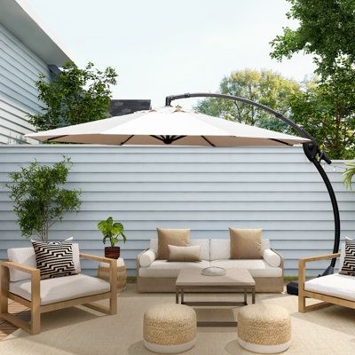 The entire patio offset umbrella frame is constructed of rust-free aluminum, from the sturdy aluminum pole to the 8 umbrella ribs. The canopy is also designed to last - it is made from water and fade-resistant polyester fabric that is UV-protected and double-coated with polyurethane for added durability. The umbrella for the pool base is included and has hidden wheels to make it easy to move around to your favorite spot. The base must be filled with either sand or water for stability and safe us Backyard Umbrella Ideas, Pool Furniture Ideas Decor, Patio Umbrella Ideas, Backyard Umbrella, Fence Plant, Deck Umbrella, Umbrella Patio, Solar Umbrella, Patio Furniture Umbrella