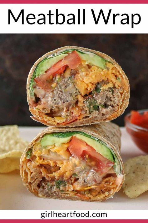 Looking for a new lunch idea? Try this easy meatball wrap! A tortilla is filled with savoury meatballs and lots of delicious toppings, like baby spinach, onion, avocado, tomatoes, cheese and tortilla strips. With lots of flavour and texture in this homemade wrap, you'll want to give this recipe a try! Meatball Tortilla Wrap, Meatball Wraps Recipes, Muffaletta Wrap, Meatball Quesadilla, Meatball Burrito, Savoury Meatballs, Meatball Wrap, Wrap Platter, Meatball Wraps