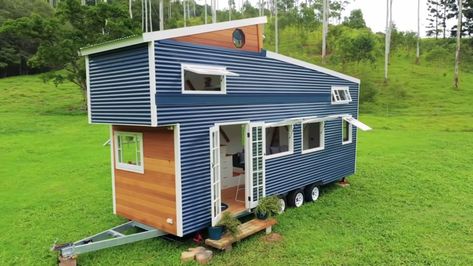 This TINY HOUSE has a pop-up roof loft that EXPANDS UPWARD once parked Tiny House Pop Up Roof, Purple Houses, Eco Houses, Porch Kits, Alternative Housing, Tiny House Talk, House Colours, Building A Porch, Huge Kitchen