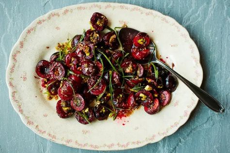 Black Cherry-Pistachio Salad With Charred Scallion Vinaigrette Recipe - NYT Cooking Cherry Pistachio, Cherry Recipes Dessert, Pistachio Salad, Fresh Rose Petals, Vinaigrette Recipe, Rose Flavored, Vinaigrette Recipes, Cherry Recipes, Nyt Cooking