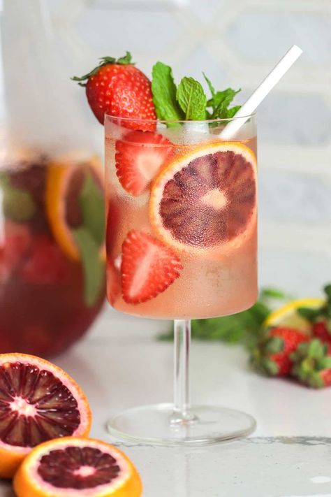 A refreshing pink sangria recipe to serve this Valentine's Galentines or spring celebration! It's a large pitcher cocktail that everyone will love. Simple Margarita Recipe, Rose Wine Sangria, Simple Margarita, Popular Drink Recipes, Triple Sec Cocktails, Rosé Sangria, Pink Sangria, Easy Margarita Recipe, Sangria Ingredients