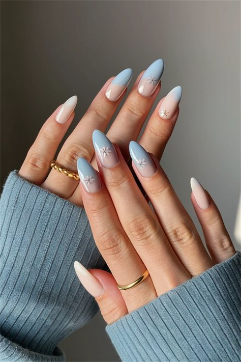 Embrace the beauty of Winter with these simple nail ideas that perfectly reflect the season's charm. Try a minimalist design featuring soft, icy blue polish paired with delicate white snowflakes or silver glitter tips. This chic yet understated look will elevate your winter wardrobe and keep your nails stylish and fresh. Perfect for cozy nights in or festive gatherings! Explore more winter-inspired designs and share your favorite. Light Blue Nails With Silver Design, Simple Nail Ideas, Cozy Winter Vibes, Glitter Tips, Light Blue Nails, Blue Polish, Winter Inspired, Blue Nail Designs, Snowflake Nails