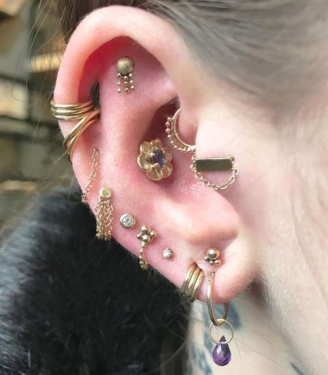 identity on Instagram: "This ear is decked out with ALL @molldolldesigns ...all made in house! The newest piercing in this collection is the lovely chandelier style flat piercing. Stop by to start your ear curation!" Ear Curation, Daith Jewelry, Cool Ear Piercings, Pretty Ear Piercings, Piercings For Girls, Cool Piercings, Cute Ear Piercings, Bar Stud Earrings, Earring Trends