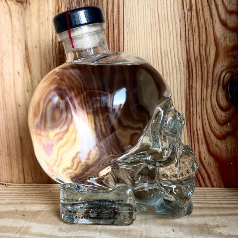 10 Ways To Upcycle A Crystal Head Vodka Skull Bottle Skull Vodka Bottle, Crystal Skull Vodka, Skull Decanter, Liquor Bottle Lights, Crystal Head Vodka, Skull Bottle, Bottle Terrarium, Diy Skulls, Liquor Bottle Crafts