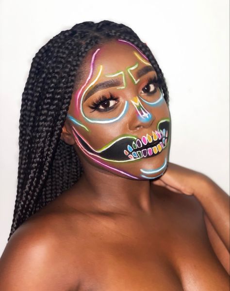 Colorful light up neon skeletal makeup Colourful Skull Makeup, Girls Skeleton Makeup, Girl Skeleton Makeup, Rainbow Skeleton Makeup, Neon Skeleton Makeup, Neon Skull Makeup, Neon Skeleton, Neon Skull, Simple Skull