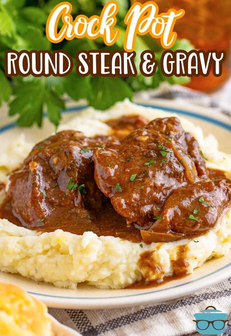 A dinner plate with Round Steaks and Gravy on a bed of mashed potatoes. Crock Pot Round Steak, Crockpot Round Steak Recipes, Round Steak And Gravy, Round Steaks, Tenderized Round Steak, Crockpot Steak Recipes, Stovetop Recipes, Steak Gravy, Steak And Gravy