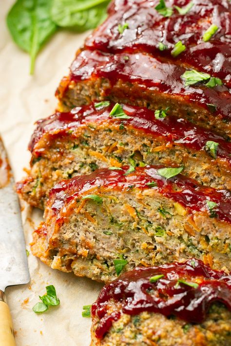 This flavorful and moist turkey meatloaf is truly the BEST! Not only does it have 3 veggies mixed into it (grated carrot, chopped spinach, grated zucchini) but it is rocking Worcestershire sauce and the perfect blend of herbs + spices, making it a true delight to eat. The added veggies not only make this healthy meatloaf even more nutrient dense, but those veggies + breadcrumbs help to keep your meatloaf nice and juicy while it cooks. Perfect for a hearty dinner or to make as part of your meal Moist Turkey Meatloaf, Air Fryer Meatloaf, Turkey Meatloaf Recipe, Meatloaf Recipes Healthy, Baked Meatloaf, Most Popular Recipes On Pinterest, Healthy Meatloaf, Moist Turkey, Turkey Meatloaf Recipes