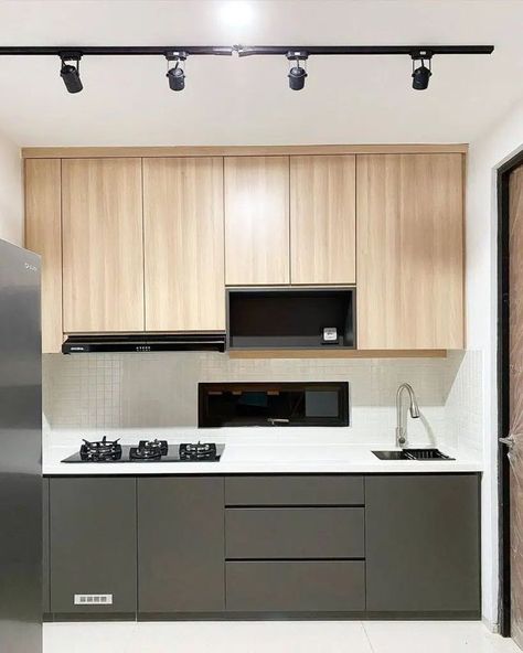 Here’s another kitchen where minimalism meets modern design in a harmonious blend of light and dark elements. Image credit: INSTAGRAM @BIRRUHOUSE Minimal Kitchen Design Small Spaces, 2024 Kitchens, Single Wall Kitchen Layout, Modern Minimal Kitchen, Organization Ideas For Small Spaces, Small Kitchen Set, Single Wall Kitchen, Dark Elements, One Wall Kitchen