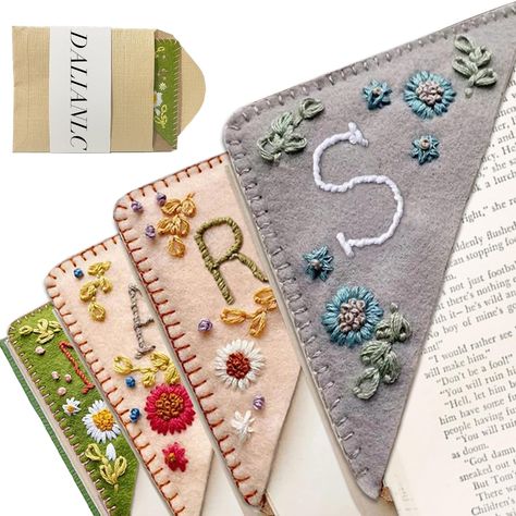 PRICES MAY VARY. Unique Design: This bookmark is stitched completely by hand and is made from felt and recycled cardboard. This is a gift full of surprises for book lovers. Multiple Choices: This bookmarks are available in 4 design options,spring/summer/ fall/ winter. Personalized Customize 26 letters, you can choose according to your needs. Size of product: 3.7*3.7inch, Isize has been adjusted many times, suitable for most books, beautiful embroidery, This page divider can make you have fun whe Hand Embroidered Corner Bookmark, Embroidered Corner Bookmark, Cute Flower Embroidery, Book Marker, Felt Bookmark, Corner Bookmark, Corner Bookmarks, Stitch Gift, Embroidery Book