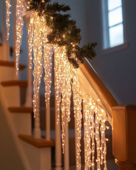 Lady lines her stair rail with LED icicles. Walking up the stairs has never felt more magical! Christmas Lights On Stairs Railings, Indoor Icicle Lights, Christmas Stair Railing Decor, Diy Icicle Decorations, Christmas Railing Decor, Diy Icicles, Icicle Lights Indoor, Walking Up The Stairs, Wedding Stairs