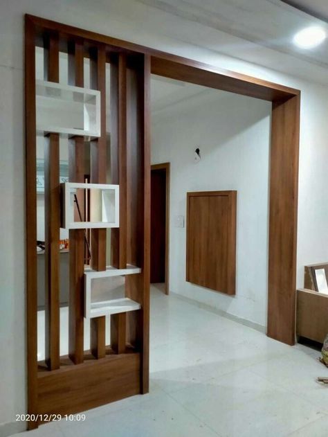 Modern Living Room Partition Wall Design 2022 64A Living Room Wooden Partition Design, Wooden Partition Design For Living Room, Partion Wall Room Dividers, Partion Design Interiors, Wall Partition Design Modern, Hall Partition Design, Hall Partion Design, Partitions For Living Room, Drawing Room Partition Design