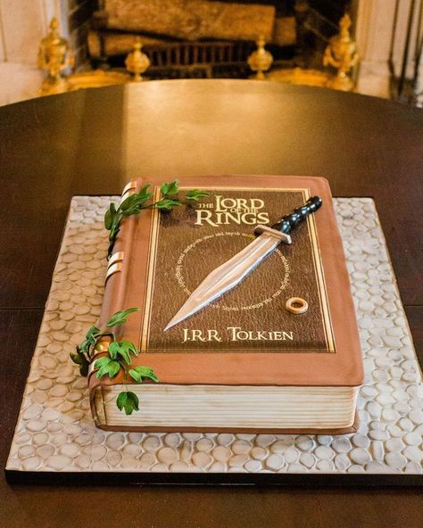 Lord of the Rings Book Cake by Kimbla's Cakes Louisiana wedding cake, Louisiana bakery, fondant wedding cake Hobbit Cake, Lord Of The Rings Book, Groom Cakes, Lotr Wedding, Cake Book, Hobbit Party, Cakes Fondant, Special Event Cakes, Realistic Cakes