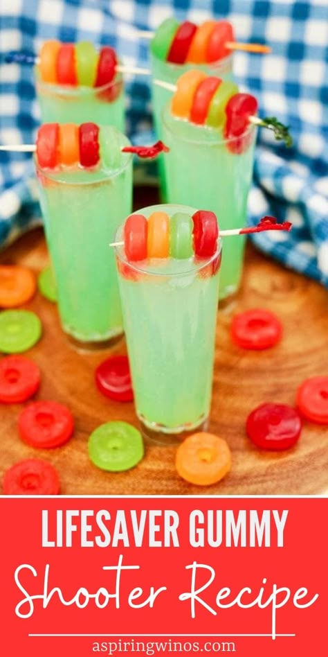 Lifesaver Gummy Shooter Recipe | Rum Shooter Recipe | Lifesaver Gummy Recipe | Tropical Shooters | Easy to make shooters #LifesaverGummy #LifesaverGummyShooters #ShooterRecipe #RumShooters #Recipes Charcuterie Shot Board, Fruity Shots Alcohol Recipes, Good Shots Recipes, Bachelorette Party Shots Recipes, Easy Alcoholic Shots, Camping Shots Alcohol, Shot Cuterie Board Party, Shooter Recipes Alcohol, Tasty Shots Recipes