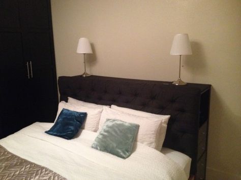 Storage headboard for ikea hackers. I like this idea especially since I some place to storage a few small items out of sight. However, I think I would like to try this with a thinner cabinet Ikea Bed Headboard, Ikea Headboard Hack, Headboard Hack, Ikea Headboard, Ikea Hack Storage, Headboard Inspiration, Ikea Expedit, Headboard With Shelves, Ikea Decor