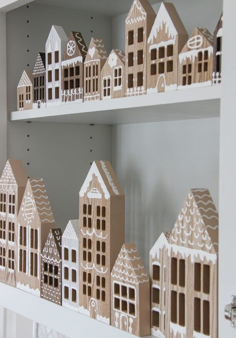 26 DIY Christmas Decorations To Make in 2023 Modern Christmas Village Houses, Wooden Houses Craft Christmas, Wooden Houses Christmas Decoration, Gingerbread House Wooden Diy, Wooden House Christmas Village, White Christmas Houses Diy, Wood House Decoration, Wooden House Decoration Christmas, Xmas Houses Christmas Villages