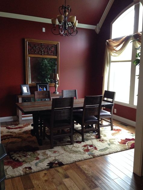 Formal dining room with sherwin Williams barn red paint. Red Paint Room Ideas, Red Dining Room Walls, Maroon Kitchen Walls, Dark Red Dining Room, Red Painted Room, Dark Red Accent Wall, Maroon Dining Room, Red Dining Room Ideas, Burgundy Dining Room