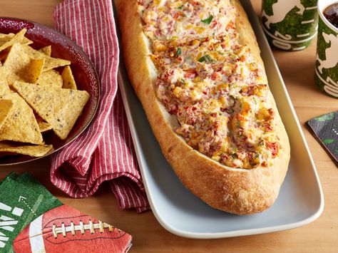 This unforgettable party appetizer blends cheese, chopped corned beef and seasonings into a creamy dip that's then packed on board a hollowed-out bread boat. Anchors away! Cheese Boat Recipe, Cheese Boat, Bread Boats, Super Bowl Menu, Trisha Yearwood Recipes, Chipped Beef, Trisha Yearwood, Superbowl Party Food, Super Bowl Food