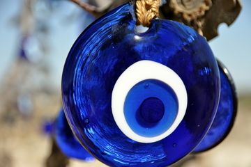 superstition - evil eye Friday The 13th Superstitions, Science And Superstition, Human Race, Friday The 13th, Health And Fitness Tips, Eye Shapes, Evil Eye, Christmas Bulbs, Holiday Decor