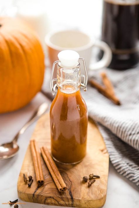 This homemade syrup with pumpkin and spice is the perfect addition to all your fall drinks. Easy to make and perfect for waffles, pancakes and desserts! Recipe from thebusybaker.ca! #pumpkinspicesyrup #pumpkinspice #syrup #fallrecipe #pumpkinspice Drinks Easy To Make, Pumpkin Spice Syrup Recipe, Homemade Pumpkin Spice Syrup, Homemade Coffee Drinks, Homemade Pumpkin Spice Latte, Pumpkin Spice Cheesecake, Creamy Pumpkin Soup, Pumpkin Syrup, Frozen Pumpkin