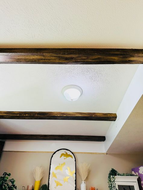 Faux wooden beams in a white ceiling Faux Ceiling Beams, Painted Beams, Wooden Beams Ceiling, Faux Wood Beams, Faux Beams, Leftover Paint, Space Projects, Wooden Ceilings, Brown Paint