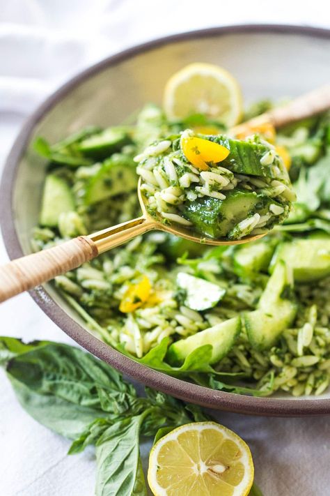 This Orzo Salad is tossed with a lemon basil dressing, with fresh cucumbers, tomatoes and arugula. A healthy, vegan, pasta salad that can be made ahead for midweek lunches or potlucks. Keep it vegan or add feta! Basil Orzo Salad, Lemon Basil Orzo, Basil Orzo, Pasta Salad Easy, Orzo Salat, Healthy Vegan Pasta, Feasting At Home, Vegan Pasta Salad, Orzo Pasta Salad