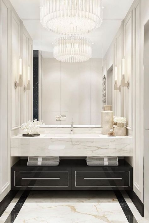 When it comes to bathroom decor, we can present several options such as glamourous, simple, or colorful decor. There are many tricks to convert a typical bathroom into a luxury ambiance, like following the main trends. After all, interior design trends defined brass finishes, marbelized wallpapers, black tubs, and framed mirrors as big hits. Get to know some fabulous bathroom ideas. #bathroomdecor #bathroomideas #interiordesign #homedecor Neo Classical Bathroom, Luxury Bathroom Decor, Toilet Design Modern, Classical Bathroom, Bathroom Decor Pictures, Classic Bathroom Design, Bathrooms Design, Luxxu Modern Design Living, Luxury Master Bathrooms