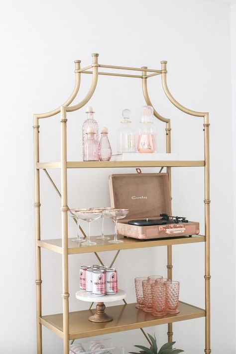 $155 Gold bookshelf decor for the bedroom and living room. Gold decor and gold furniture decor are amazing ways to elevate the look of your home. This gold bookcase and gold nightstand is the perfect buy for anyone obsessed with gold fall decor, a gold office or gold room decor. | Image credit: @teresalaucar Gold Bookcase, Blush Living Room, Living Room Decor Neutral, Gold Furniture, Bookcase Styling, Salon Suites, Interior Vintage, Living Room Accessories, Neutral Living Room