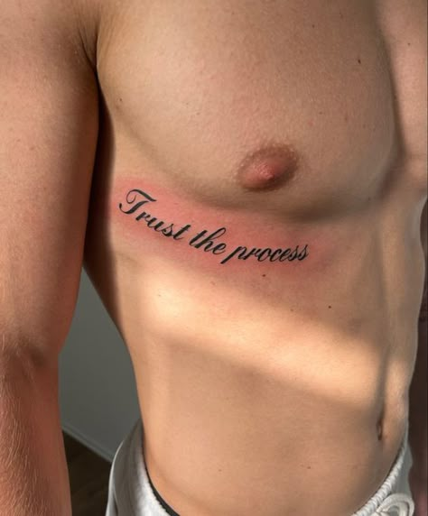 Tattoo Ideas On Chest Men, Men Side Rib Tattoo, Ribs Tattoos For Guys, Small Tattoos For Men On Chest, Font Tatoos Men, Mens Gym Tattoos, Men’s Abdomen Tattoo, Unique Tattoos For Men Chest, Men Hidden Tattoo