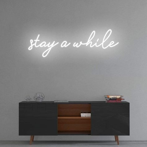 #NeonSigns #BrightIdeas #NeonSignNames #NeonInspiration #NeonRoom #RoomDecor Stay Awhile Neon Sign, Neon Light Sayings, Neon Living Room Sign, Neon Sign Phrases, Clever Neon Signs, Neon Sign Ideas Words, Neon Sign Interior, Neon Sign In Living Room, Backyard Neon Sign