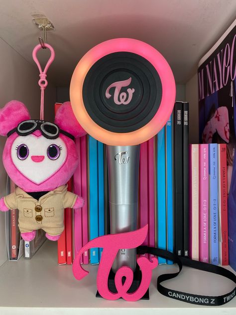 (Lightstick NOT included) The TWICE CBZ Logo Stand is a simple, low-cost solution to hold your CandybongZ or your Original Candybong. The front has the Twice logo in your choice of all of the member colors as well as Magenta. The logo also features a 'sparkly' texture that really makes these look great! These come in 2 pieces and the logo slides into the front of the stand's base. Once assembled, they cannot be taken apart. Grab one for yourself and one for a friend. Don't accept poor-quality and expensive imitations of this ORIGINAL product! The CandybongZ is shown for demo purposes only and is not included. Please note that 3D printed items are never perfect and may show tiny imperfections in some places (mostly on the bottom surfaces). I inspect and discard anything that I would not per Lightstick Stand, Twice Logo, Logo Twice, Dara Kpop, Twice Once, Take Apart, Kpop Aesthetic, Wallpaper Pc, Photo Cards