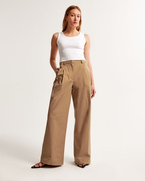 High rise, wide leg pants in a casual twill fabric with figure-flattering pleating details, a functional fly, pockets and adjustable utility detailed waistband. Kuzco Disney, Black Flare Pants, Tan Trousers, High Rise Black Jeans, Wide Leg Dress Pants, Linen Blend Pants, Tapered Trousers, Wide Leg Linen Pants, Brown Pants