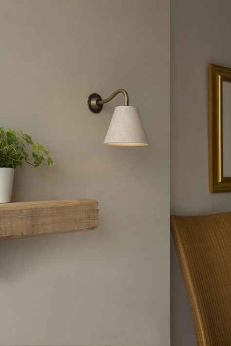 The Carrick Wall Light is the latest addition to our best-selling Club family of lights and will make a lovely addition to your home. Not only does the new design - combining the Club Wall Light's brass arm with a fabric shade of your choice – mean that you can style it as you like, it also means you can choose the orientation for any number of totally different looks. Fit the Carrick upwards for a traditional appearance, or downwards for a more modern twist. Club Lights, Hallway Wall Lights, Restful Bedrooms, Wall Light Fittings, Linen Lamp Shades, Bedside Wall Lights, Wall Lights Living Room, Dining Room Spaces, Brown Cow