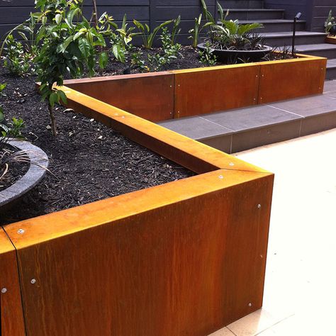 Back to Feature Walls   At Lump we measure, design and fabricate all kinds of Corten steel and aluminium cladding for structural walls, retaining walls and decorative walls.  What is great about our architectural cladding systems at Lump is that although the Corten steel cladding is its own structure, it is essentially cosmetic. Meaning Steel Retaining Wall, Steel Garden Edging, Garden Retaining Wall, Steel Cladding, Garden Fence Panels, Landscaping Retaining Walls, Retaining Walls, Garden Edging, Corten Steel