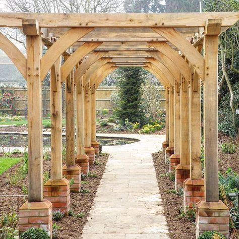 This #handcrafted #pergola creates a great walkway in this #garden  #symmetry #oak #oakframe #timber #wood #handmade #bespoke #traditional #craft #timberframe #Surrey Pergola Arch, Oak Pergola, Garden Archway, Building A Pergola, Backyard Retreat, Outdoor Decor Backyard, Diy Pergola, Garden Pathway, Timber Wood