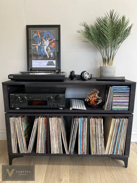 ---------------------------------------------------------------------------- Visit us on: KRUDFURNITURE.CO.UK or VAREZZO.COM ----------------------------------------------------------------------------The Varezzo Furniture Turntable Stand and Vinyl Storage is a sleek and practical solution for organizing your vinyl record collection. With its Italian, modern design and high-quality construction, this piece is the perfect addition to any music lover's home. The stand features vinyl storage gaps t Music Studio Inspiration, Music Lover Room, Vinyl Organization, Vinyl Living Room, Vinyl Furniture, Cool Shelves, Home Music Rooms, Modern Italian Design, Turntable Stand