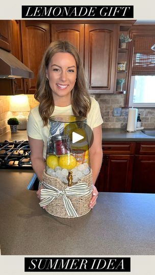 613K views · 33K reactions | Cute gift idea for Mother’s Day and this spring/summer 🍋 Comment “LEMON” to be sent all the items I used here 🩷

I adore this drink dispenser and wanted to fill it with all things lemonade theme 🤗 I added reusable ice cubes, lemons, lemonade mix, a dish towel, raspberries, blueberries, and a lemon squeezer 🥰 

#giftideas #mothersday #mothersdaygiftideas | Tara Panasiuk | the_magnolia_mercantile · Original audio Lemonade Gift Basket Ideas, Lemonade Basket Ideas, Beverage Dispenser Gift Ideas, Drink Dispenser Gift Ideas, Beverage Dispenser Ideas, Lemonade Gift Basket, Pineapple Lemonade Punch, Summer Gift Baskets, Reusable Ice Cubes