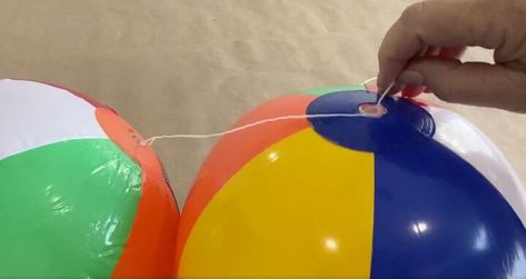 How To Make A Beach Ball Arch, Beach Ball Garland Diy, Beach Ball Arch Diy, Beach Ball Decorations, Beach Ball Backdrop, Beach Ball Arch, Beach Ball Garland, Waterslide Party, Beach Ball Party