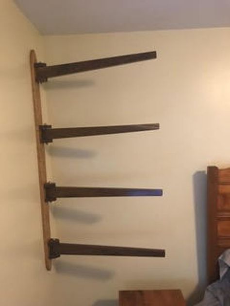 This is a wall mounted display (shown with quilts) rack made out of a light colored wood, in this case curly oak, and a dark colored wood, in this case walnut. The rack is 52 inches tall with 4 arms that are 27 inches long. They swing completely in both directions. This could be used to display Hanging Quilt Rack, Quilt Wall Hangers, Wall Hanging Quilt, Blanket Rack, Quilt Hangers, Quilt Display, 4 Arms, Fantasy Furniture, Quilt Rack