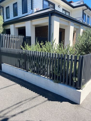 How to build small picket fence on top o... | Bunnings Workshop community Small Picket Fence, Brick Retaining Wall, Rendered Brick, Retaining Wall Fence, Front Porch Stairs, Construction Fence, Porch Stairs, Types Of Bricks, Timber Posts