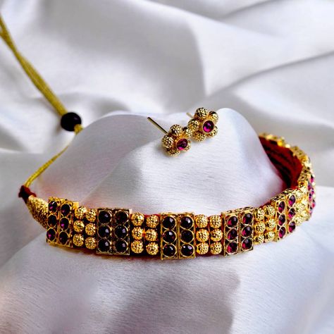 Adorn yourself with the timeless beauty of a Traditional Kolhapuri Chinchpeti Choker. 🌟✨ #EthnicElegance" To shop do visit:www.kalapuri.com or visit on: https://kalapuri.com/products/traditional-kolhapuri-chinchpeti-choker?_pos=1&_sid=bb7675af6&_ss=r Use First15 code for upto 15% off for new user #kalapuri #KolhapuriChinchpeti #TraditionalJewelry #ChokerNecklace #EthnicJewelry #IndianJewelry #Handcrafted #HeritageJewelry #EthnicElegance #JewelryAddict #FashionJewelry #JewelryOfTheDay #Tra... Heritage Jewellery, Black Beaded Jewelry, Traditional Jewelry, Ethnic Jewelry, Black Beads, Indian Jewelry, Timeless Beauty, Choker Necklace, Beaded Jewelry