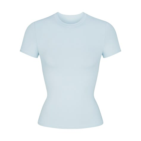 Our viral t-shirt in the cotton everyone craves. This perfect five-star tee is made with our stretchy, lightweight cotton that enhances your curves with its body-hugging fit and elevates your comfort with its incredibly soft feel. Features stitching details along the short sleeves and hem and hits below the natural waist. Fits true to size. Skims Tee Shirt, Preppy Clothes To Buy, Modest Clothes For Women, Stockholm Clothes, Fake Clothes, Clothes To Buy, Tshirt Aesthetic, Ballet Top, Preppy Tops