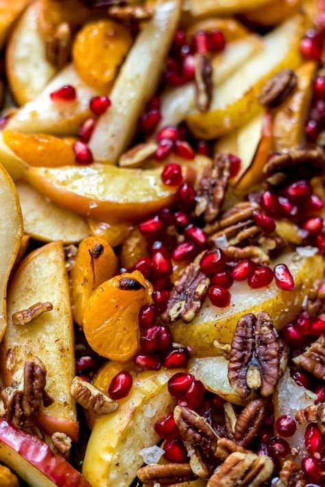 These Spiced Baked Apples, Pears and Mandarins topped with Pecans and Pomegranate are a simple vegan dessert or topping. In less than 15 minutes you can have a fresh and flavorful fruit topping for yogurt, oatmeal or cheesecake. This roasted fruit is good enough to eat on its own. This recipe is vegan, Paleo, dairy free and gluten free. Spiced Fruit Bake, Vegan Fruit Dessert Recipes, Roasted Fruit Dessert, Vegan Fruit Recipes, Winter Fruit Desserts, Feta Dessert, Vegan Fruit Dessert, Hot Fruit Bake, Baked Fruit Recipes