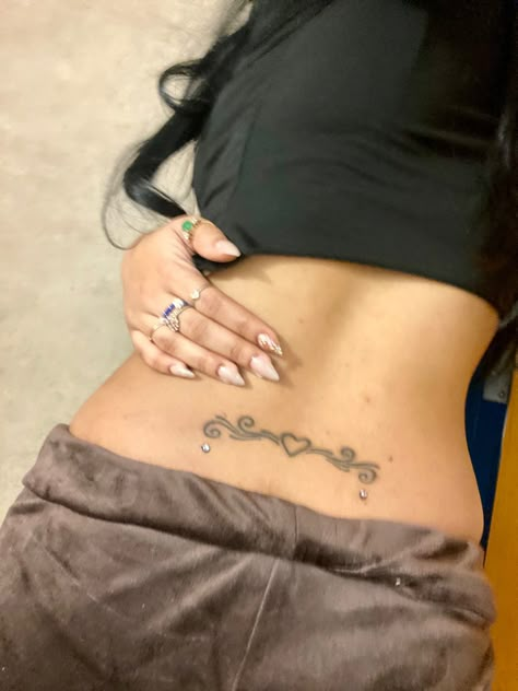 tramp stamp tattoo Back Pearcing, Mid Stomach Tattoo, Tramp Stamp With Back Dermals, Waistline Tattoos, But Tattoos For Women, Cute Back Tattoos, Pretty Tramp Stamp Tattoos, Trampstamp Tattoo, Cute Tramp Stamp Tattoos